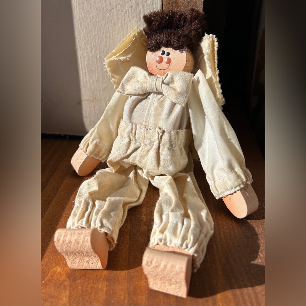 Vintage Angel wooden with aged-appliquéd wings. Signed by artist.